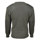 Green sweater with black shoulder patches on a white background