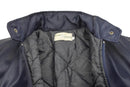 Close-up of the inside quilted liner and collar of a blue Lambert French Air Forces bomber jacket.