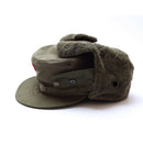 Genuine Austrian Army military winter cap in olive with faux fur lining and insignia badge for cold weather protection