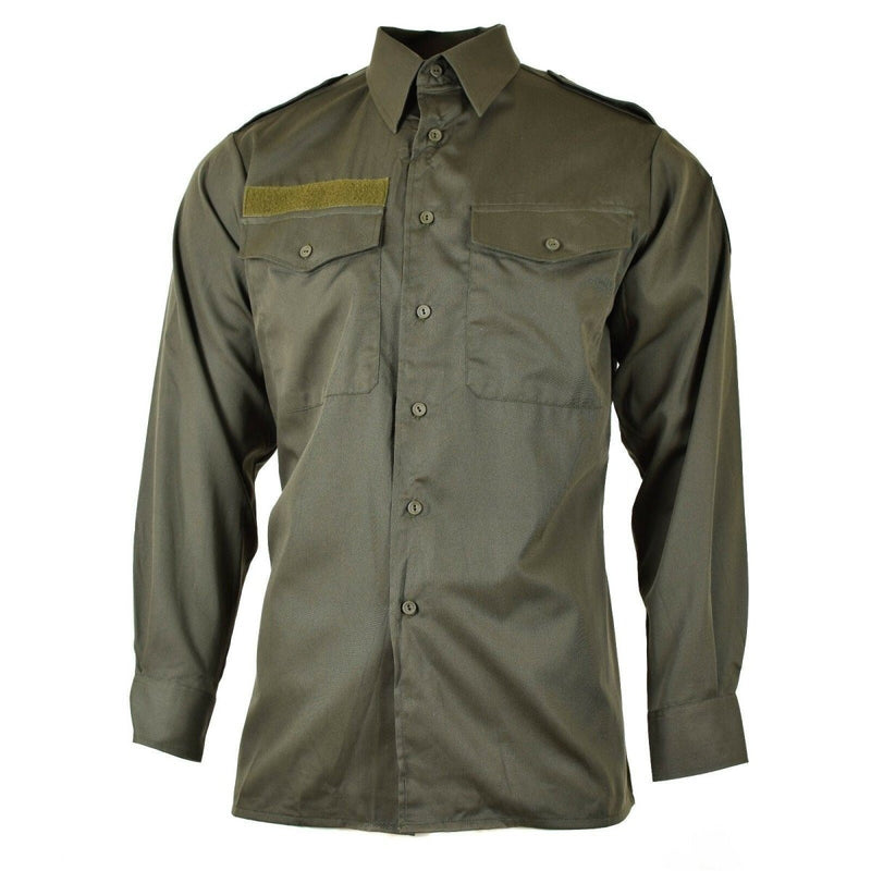 Genuine Austrian army M65 olive green long sleeve military combat shirt with button-up front and chest pockets.