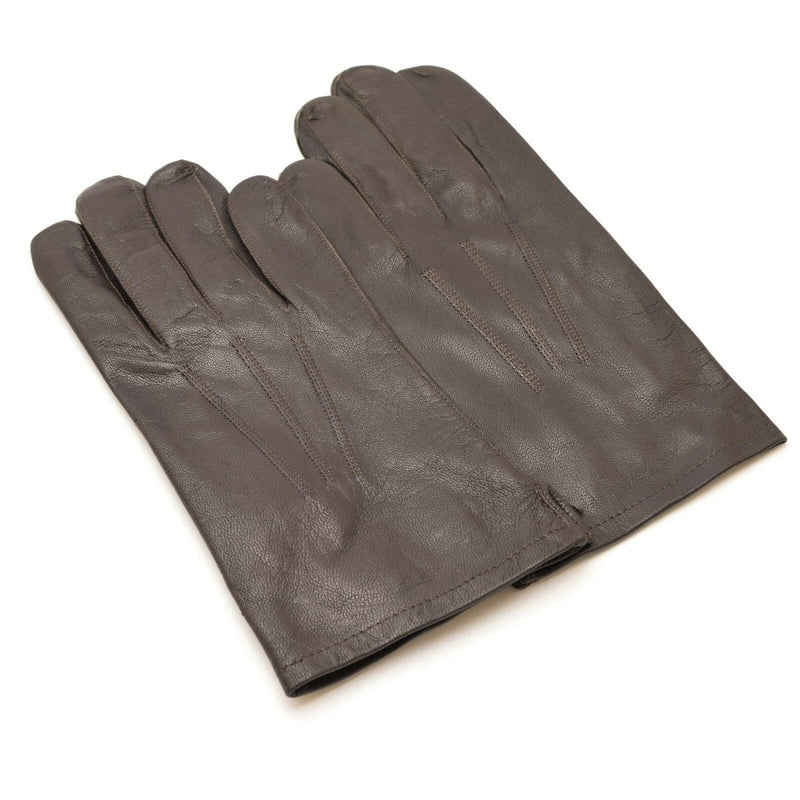 Pair of genuine Belgian army black leather full finger military surplus gloves on white background