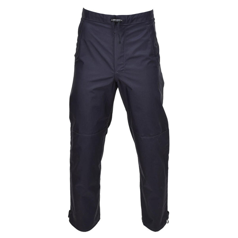 Genuine British police waterproof rain trousers in blue, designed for durable outdoor wet weather protection.
