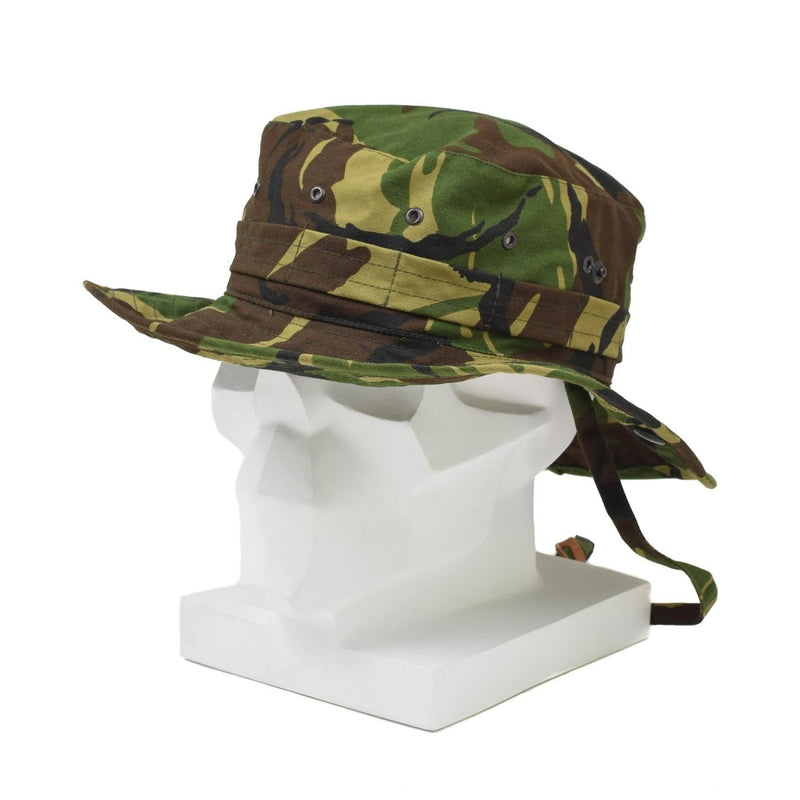 Genuine Dutch military boonie hat in DPM camo with wide brim, neck flap, ventilation eyelets, and adjustable chin strap.