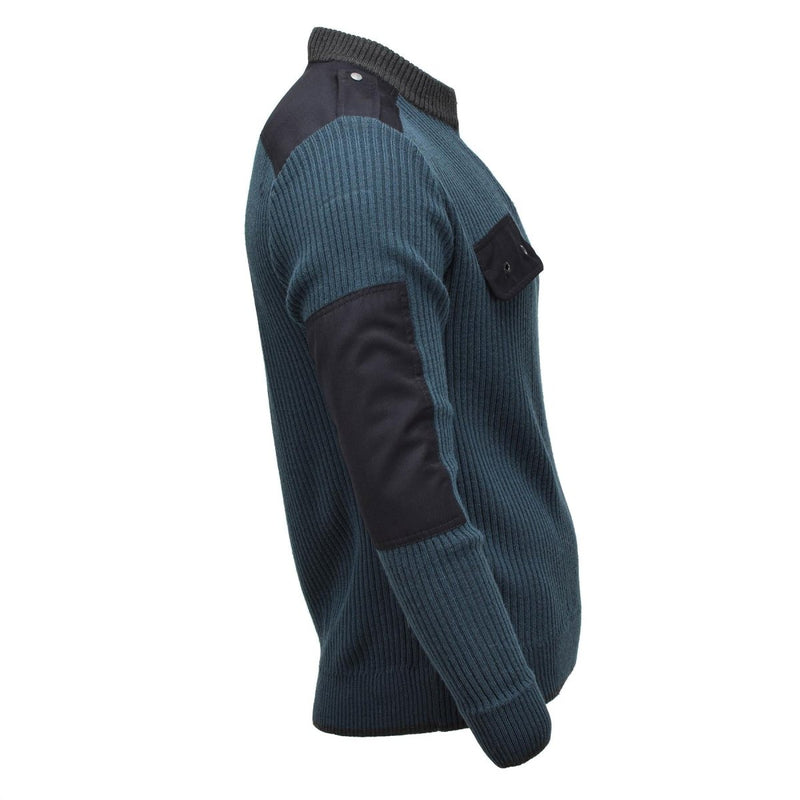 Side view of blue rib knit Dutch military pullover sweater with reinforced elbow patches and quarter zip collar