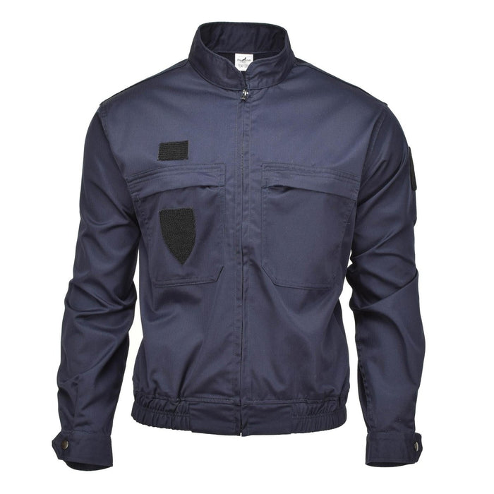 Chaqueta de policía militar francesa genuina de color azul marino con cremallera frontal, múltiples bolsillos, puños ajustables y cinturilla elástica.