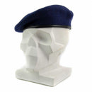 Genuine German Army dark blue wool beret with leather trim displayed on a white mannequin head.