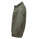Side view of genuine Greek military M65 field jacket in olive green with buttoned pockets and cuffs.