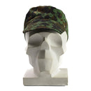 Genuine Guinea Bissau army cap in digital jungle camouflage on a white mannequin head with brim and adjustable strap.