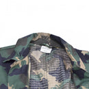 Close-up of genuine Hungarian army M90 camo shirt collar in four-color camo ripstop fabric with label inside