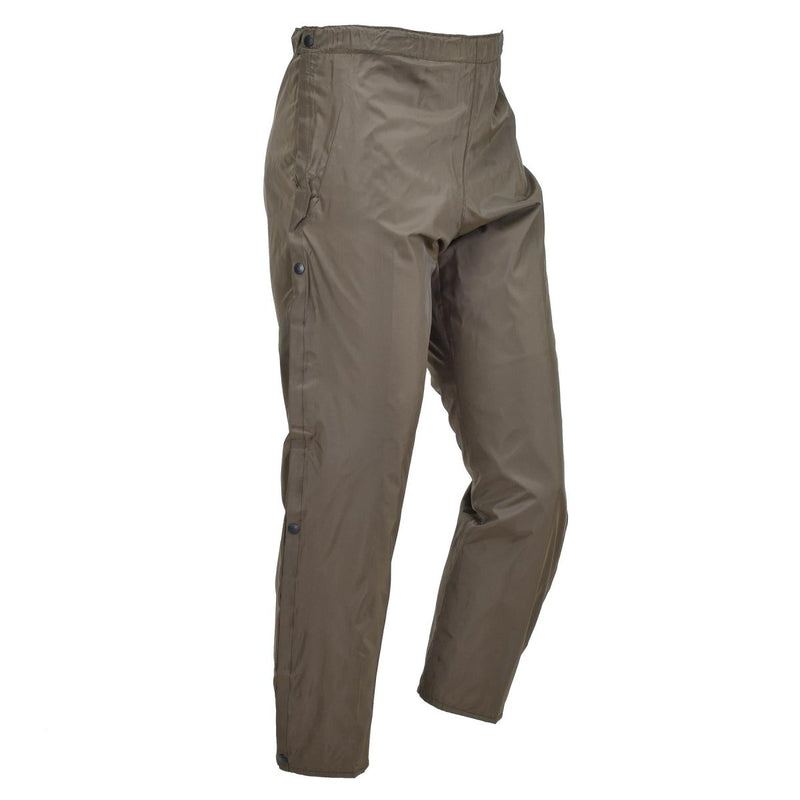 Genuine Italian military waterproof rain pants in olive drab with thermal lining and side leg openings for easy wear.