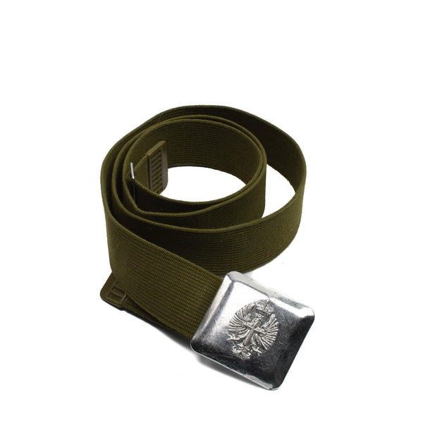 Vintage Spanish army belt made of canvas with a metal buckle featuring a detailed military emblem design.