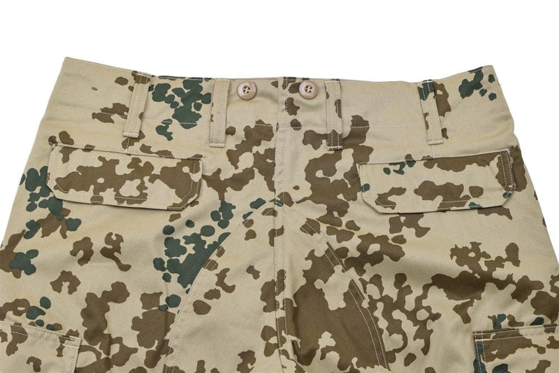 Close-up of Leo Kohler Commando tactical field pants in Tropentarn camo with reinforced stitching and multiple pockets.