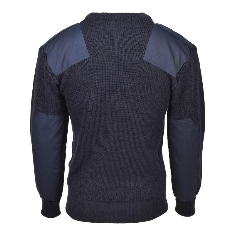 Back view of a dark gray sweater with blue shoulder patches on a white background