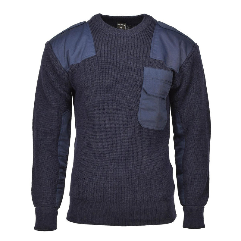 Navy blue sweater with patch details on a white background