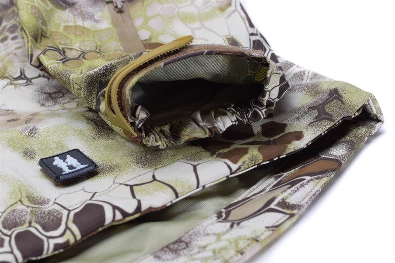 Close-up of Mil-Tec MANDRA camo waterproof hardshell jacket showing zipped pocket and fabric details.