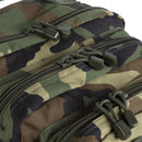 Close-up of durable woodland camo fabric and zippers on MIL-TEC U.S. Assault 36L trekking rucksack backpack