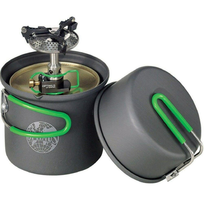 Sistema compacto de cocción individual OPTIMUS CRUX Lite con mango verde para cocinar al aire libre de manera liviana para acampar y hacer caminatas.