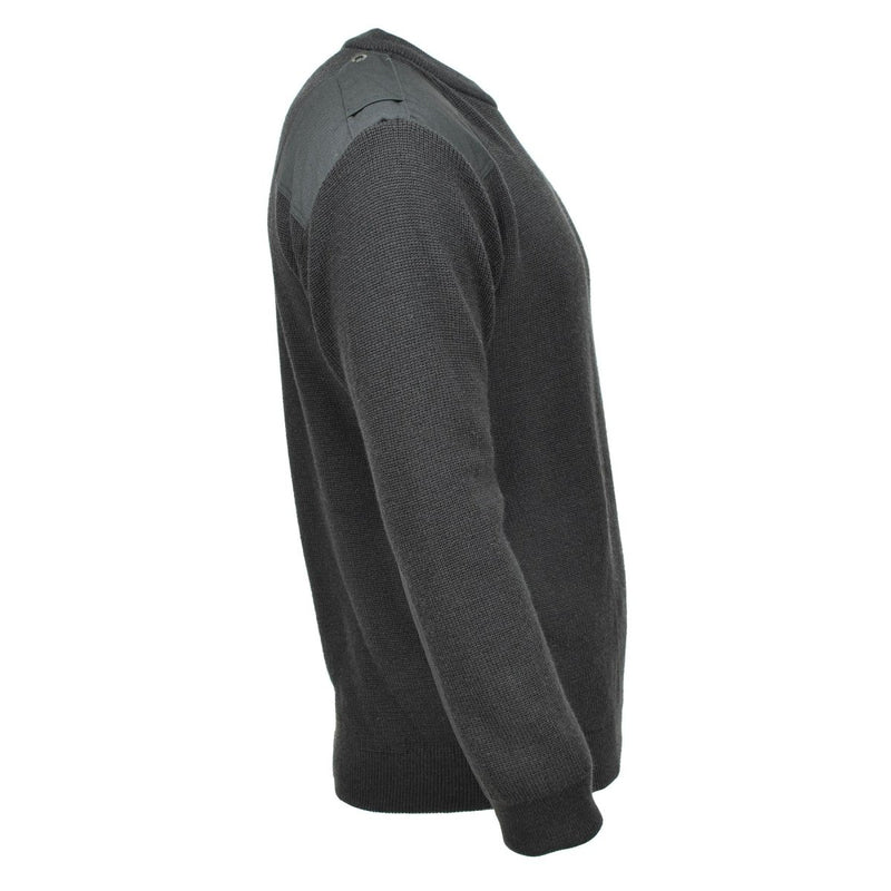 Side view of original Belgian military dark green wool sweater with shoulder patch and long sleeves pullover