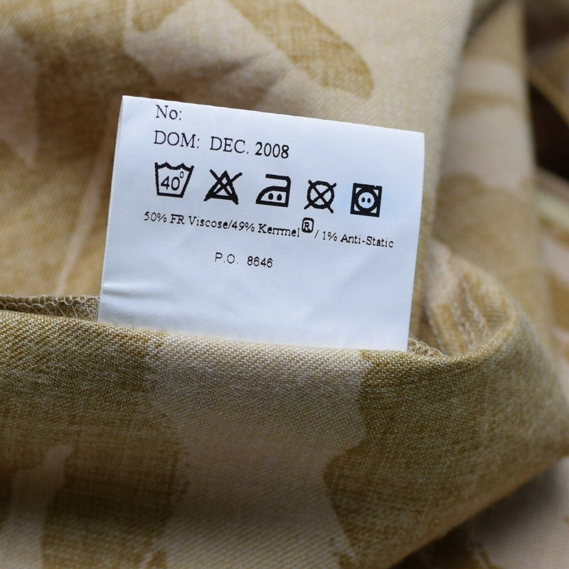 Clothing care label on British desert camo fire-resistant military combat jacket fabric close-up
