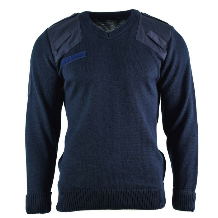 Jersey Commando Jumper de la policía del ejército británico en color azul marino con cuello de pico, hombros reforzados y puños y cintura de canalé.