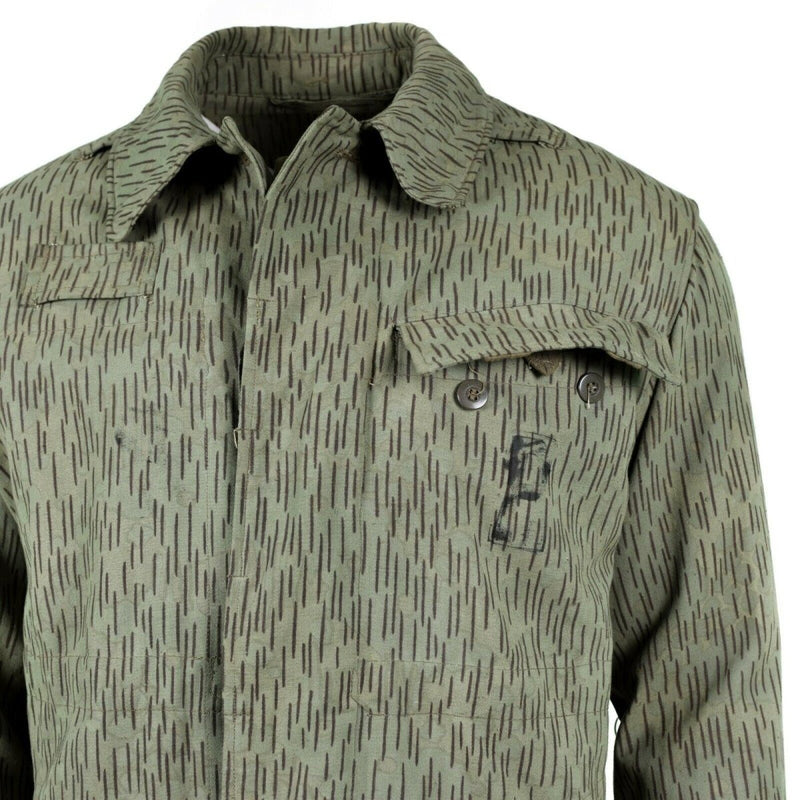 Vintage Czech army M60 field jacket in raindrop camouflage with buttoned chest pocket and classic collar design