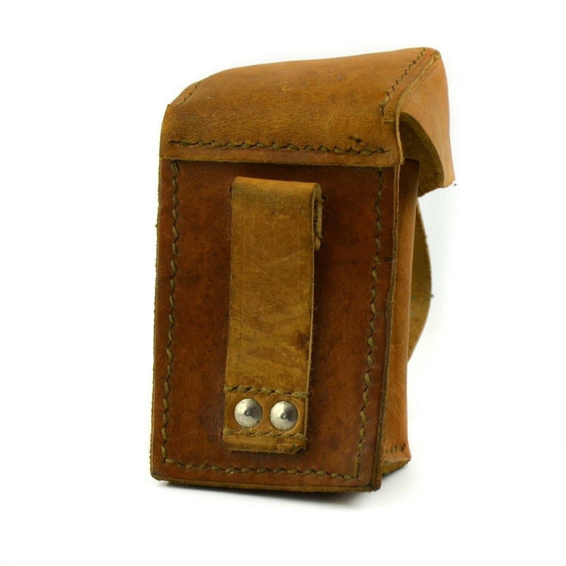 Vintage brown leather ammo magazine pouch from original Yugoslavian army with secure button closure and belt loop.