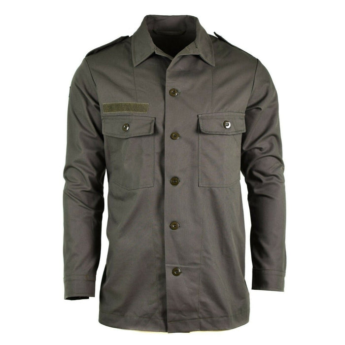 Chaqueta camisera de campo original Dutch Army M65 en color verde oliva con bolsillos en el pecho y charreteras, estilo militar y diseño duradero.