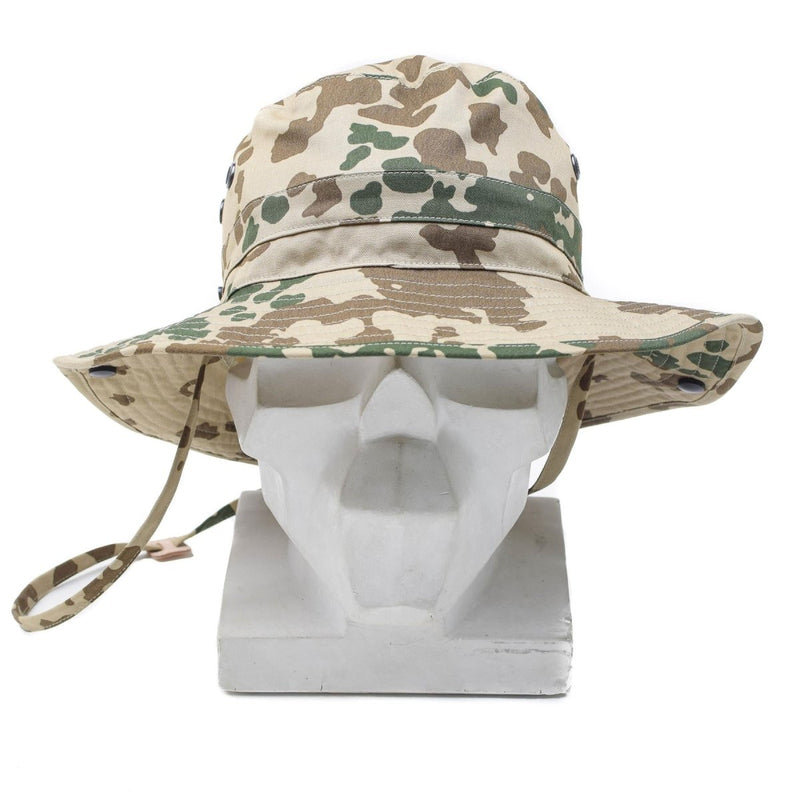 Original German Army tropical camouflage boonie hat with wide brim and chin strap for sun protection and outdoor use