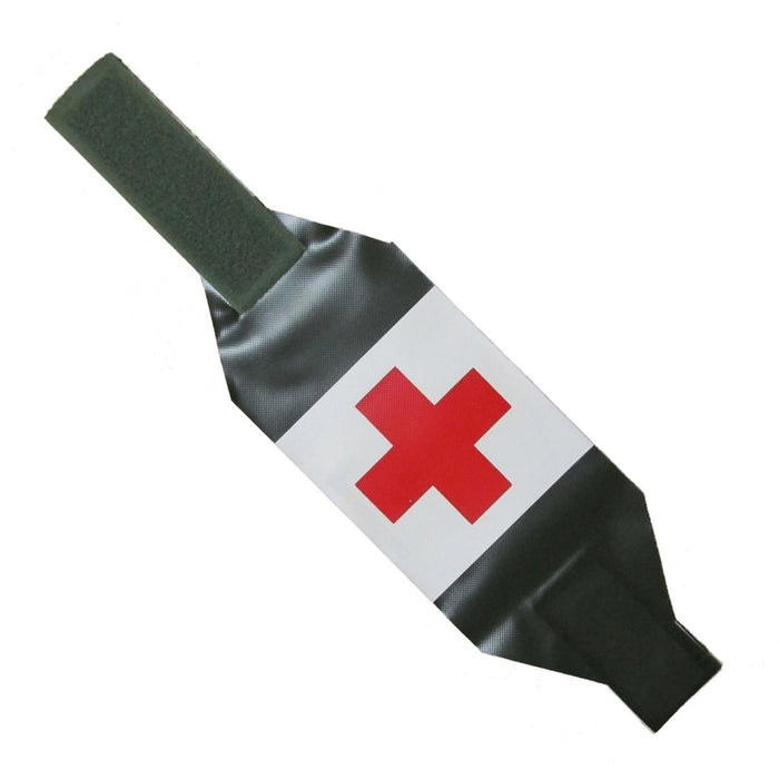 Tapa de botella con cruz roja sobre fondo blanco.