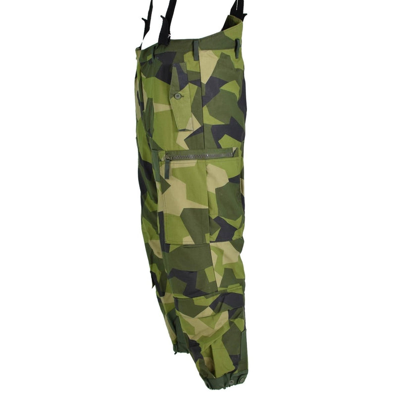 Original Swedish M90 Splinter camouflage thermal tanker pants with suspenders and secure pockets for cold weather use.