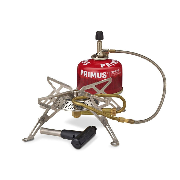 Quemador de camping Primus Gravity III de alto rendimiento con patas plegables, recipiente de gas y herramienta de encendido para cocinar al aire libre.