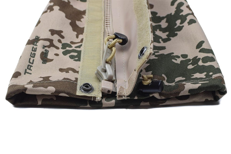 Close-up of folded TACGEAR waterproof leg gaiters in Flecktarn Desert camo with zipper and adjustable drawstring closure