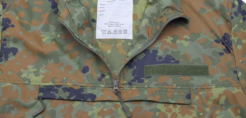 Close-up of TACGEAR flecktarn camo ripstop windproof hunting shirt with zipper and chest pocket pouch detail